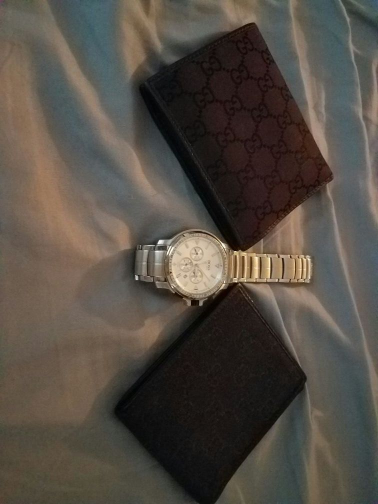 Gucci wallets and Hugo Boss watch
