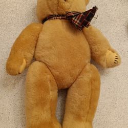 Blonde stuffed 16” teddy bear with plaid tie. 