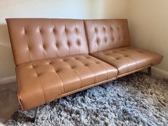 Faux leather tan futon sofa