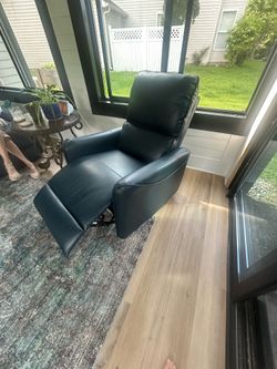 2 leather matching swivel rocker recliners