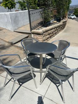 Patio table set with 4 chairs