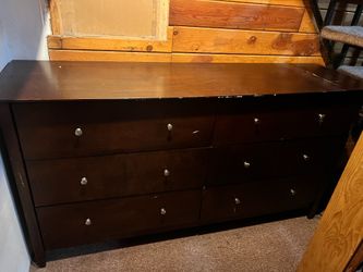 Dark brown wood dresser