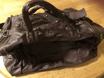 Brand new ox blood in color genuine leather traveling
