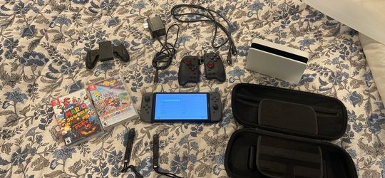 Nintendo Switch OLED with 2 games