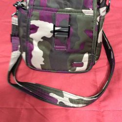 Lug camp berry crossbody ( or waist) multi compartment bag.