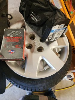 Honda civic studded snow tires and chains.