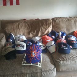 Collection Of Broncos Hats And Hat Rack