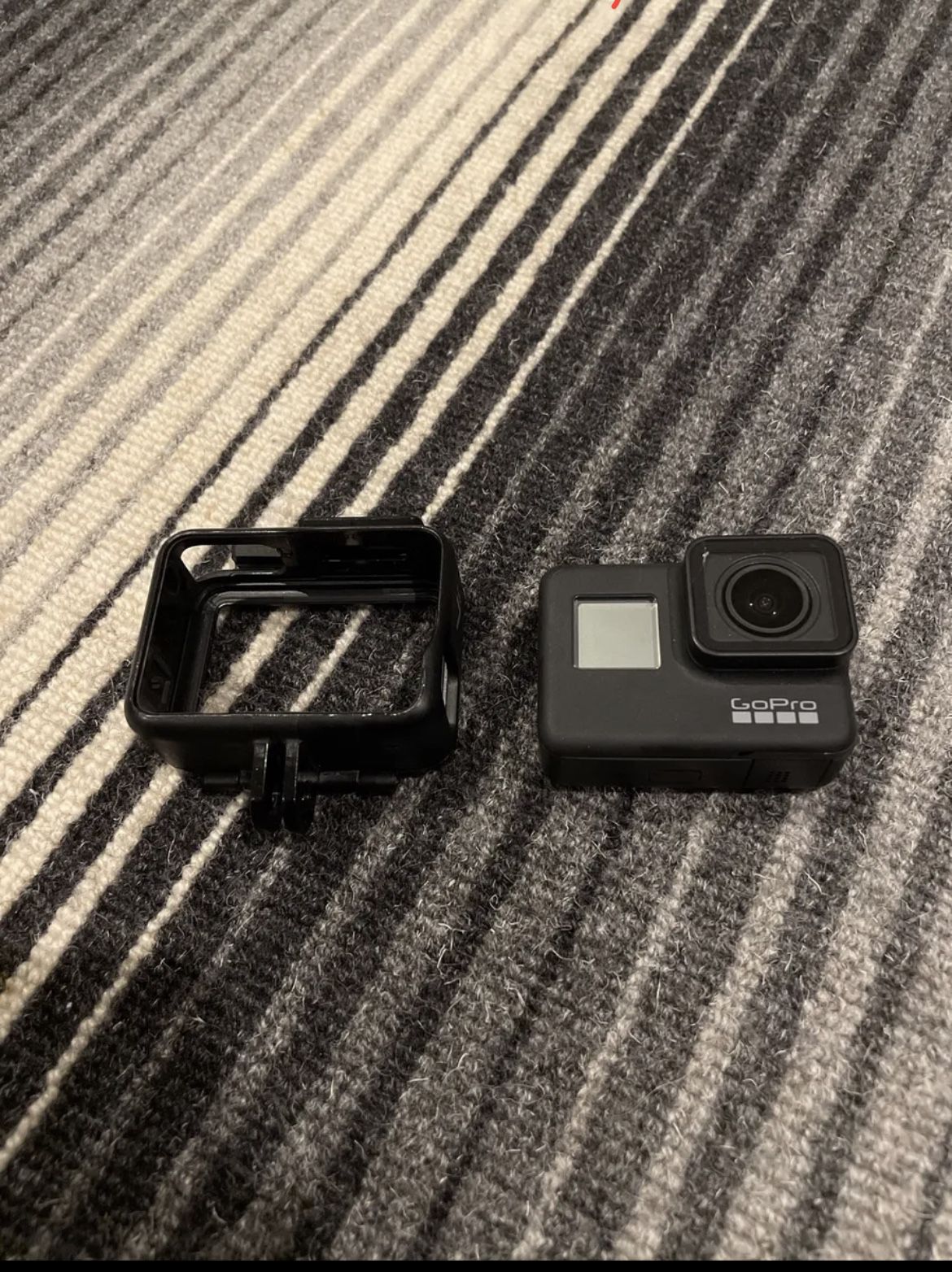 GoPro HERO7 Action Camera - Black - PRODUCT INCLUDES CAMERA, BATTERY, AND A CASE