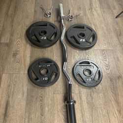 Beautiful BRAND NEW Curl Bar With Pair Of 25s And 10s 