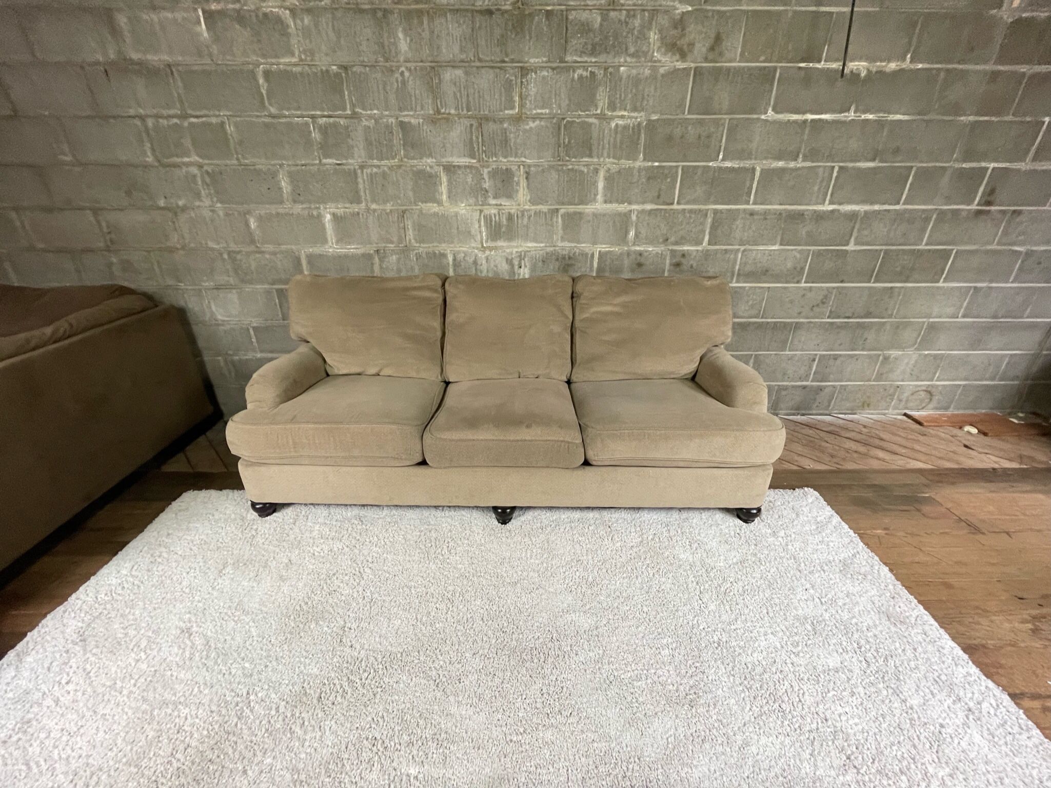 Couch “WE DELIVER”