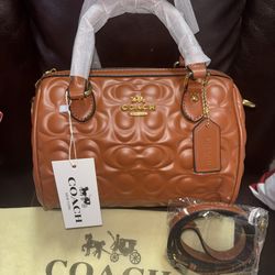 Brown coach bag