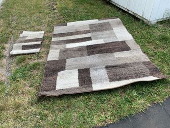 Large rug with smaller one