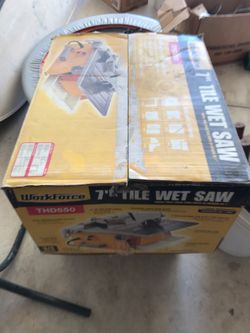 7” tile wet saw working great used only once for bathroom complete in box $50 FIRM