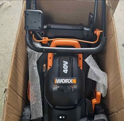 NEW PUSH LAWNMOWER FOR SMALL YARDS....14 IN...CHARGER, 2 BATTERIES AND VACUUM INCLUDED...$ 200