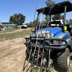 Assorted Fishing Poles And Reels See Description