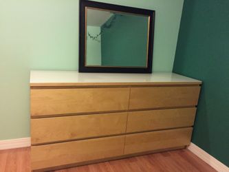Dresser with glass top mirror is sold