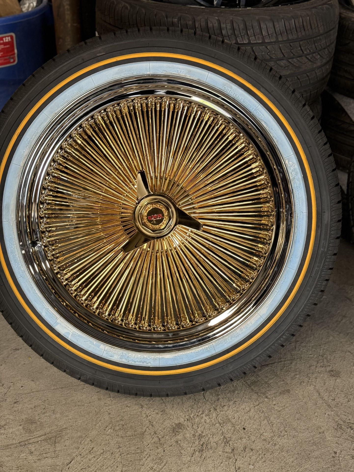 22” Center Gold 150 Spoke Wire Wheels 285/45R22 Vogue Tires 