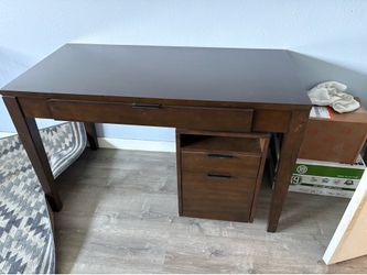 desk with file cabinet