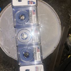 Five individual slabbed coins all of them are MS 69 ultra cameo deep cam