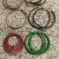 7 Pairs Of Large Hoop Earrings,2 Gold,silver,red,green,aqua And Gold,black And Silver