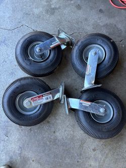 (4) Haul Master 10” pneumatic swivel casters.