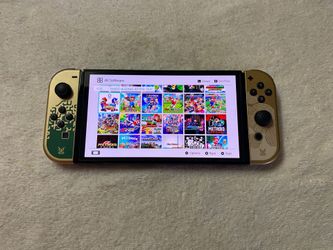 NINTENDO SWITCH OLED with 125 GAMES POKEMON,ZELDA,MINECRAFT,MARIO PARTY,MARIO KART and Many More