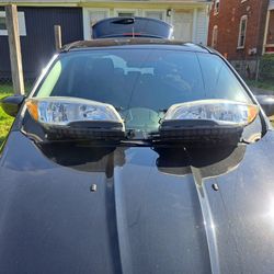 Headlight assembly. Ford Escape.