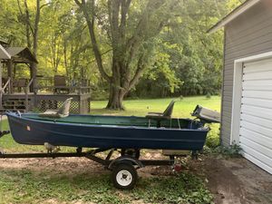 Photo 12 ft fishing boat and trailer