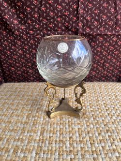 Vintage crystal bowl on brass stand