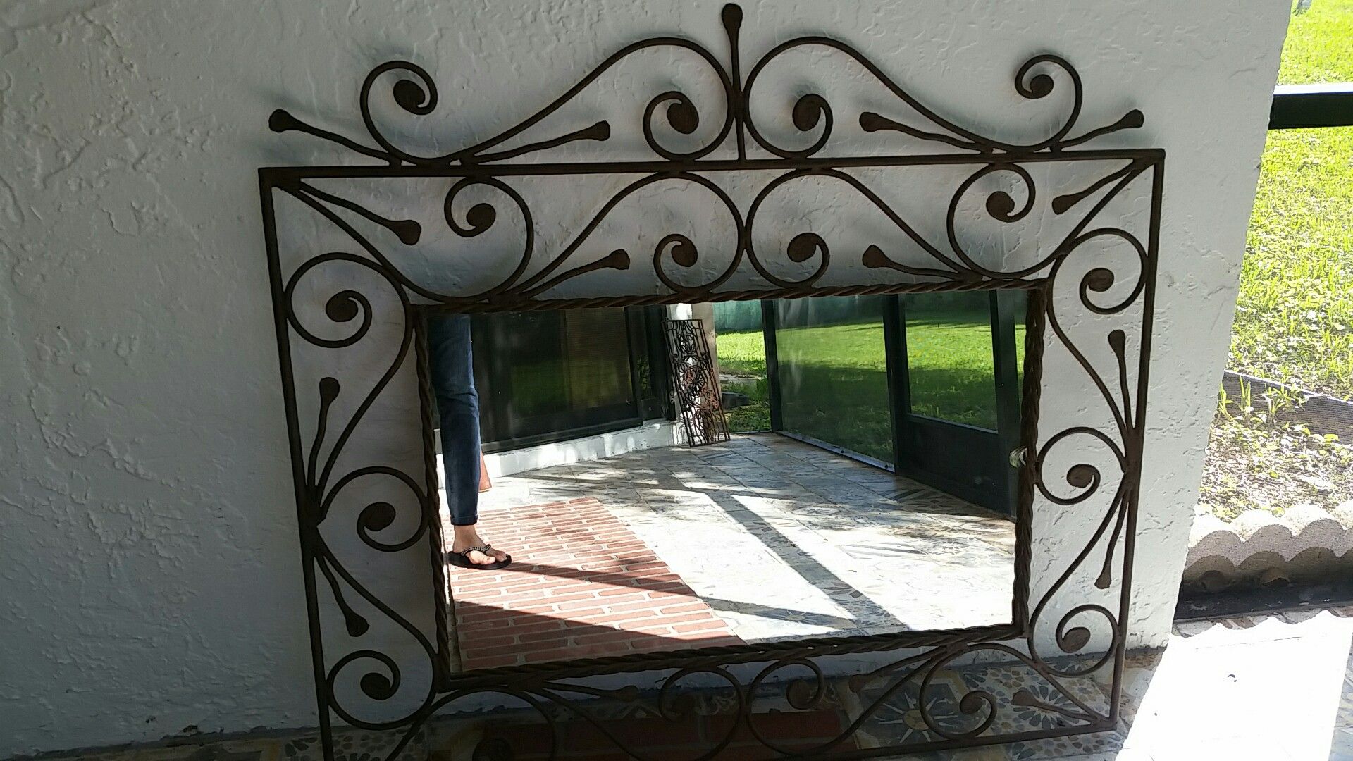 Wrought iron wall mirror