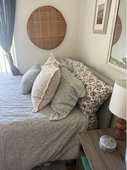 Full Size Mattress and Grey Fabric Bed