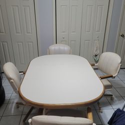 Dining Table Plus 4 Seats And 2 Leather Chairs