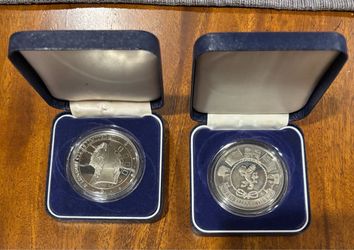 Two QE2 casino coins!