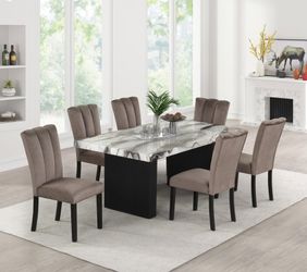 Modern design dining set features a multi-color pattern and a double pedestal base