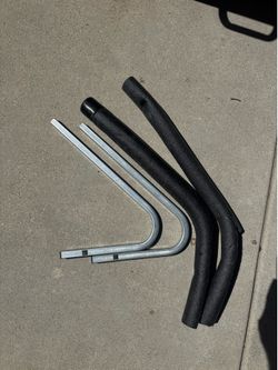 Surfboard wall brackets