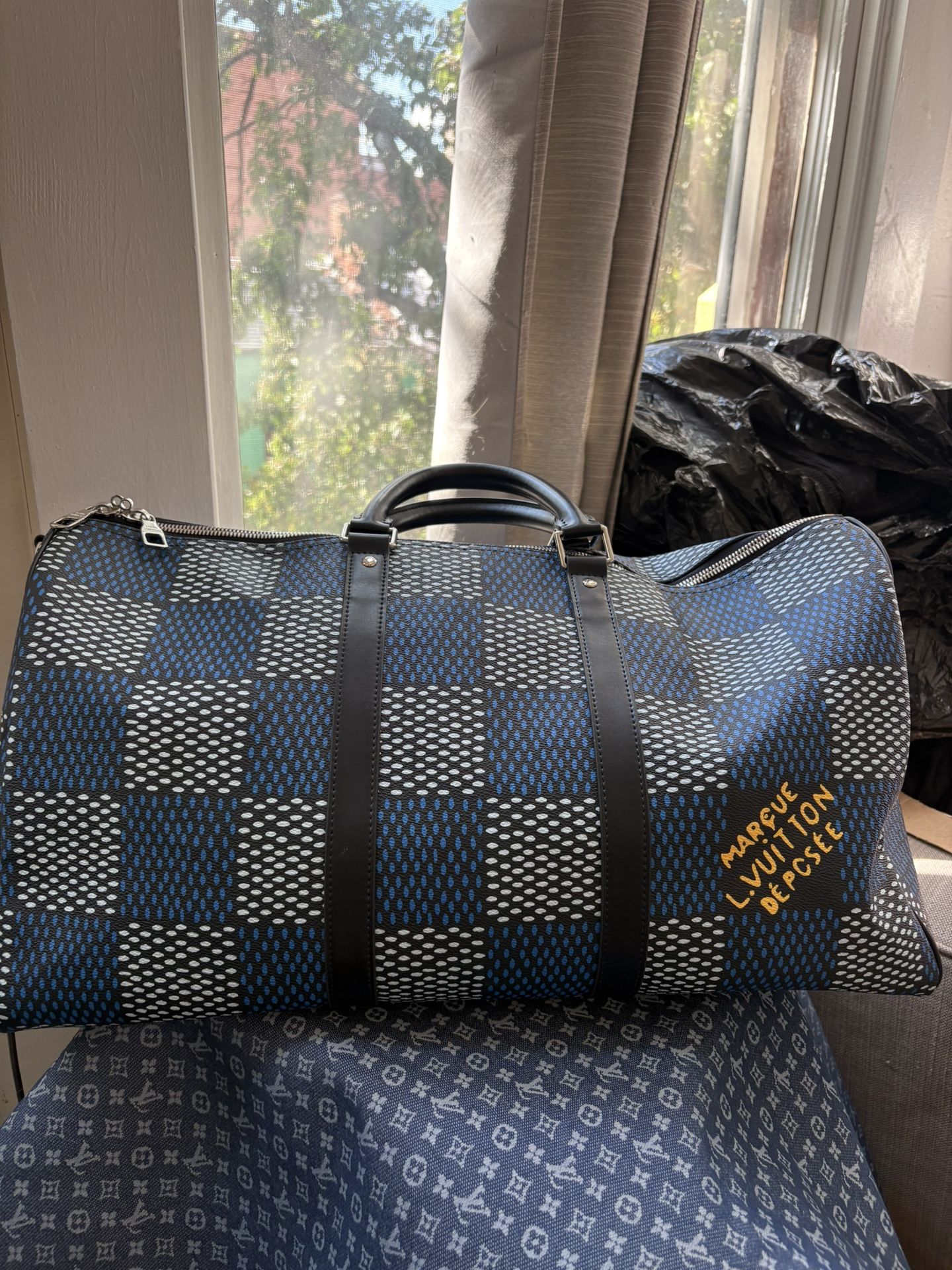 Louis Vuitton Duffle Bag