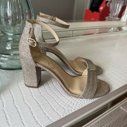 Jessica Simpson pumps, champagne color, size 7, 3-inch heel. In very good condition—worn only once.