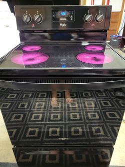 Whirlpool glasstop stove (delivery available)