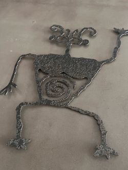 Vintage 90s Moab Style Man Metal Wall Art