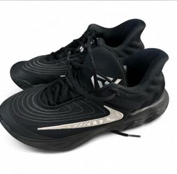 Nike Black Low-Top Sneakers with Silver Swoosh