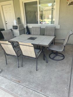 Patio table and 6 chairs!! $80