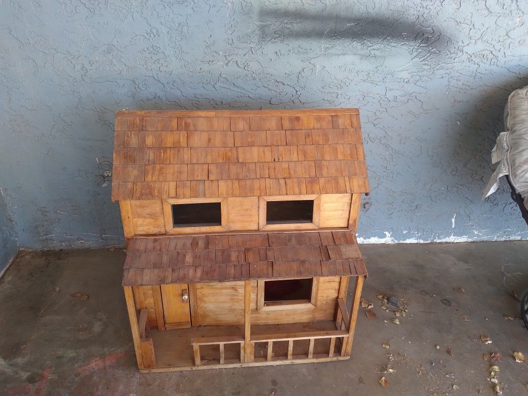 Hand made log house doll house