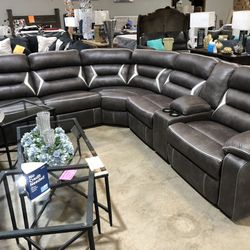Black faux leather power reclining sectional • Kincord 