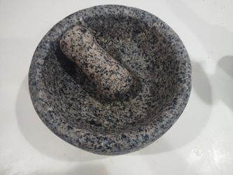 Lava rock large grinding bowl