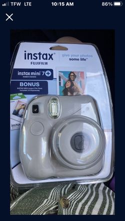 Poloroid Camera (includes batteries and 10 pictures/film