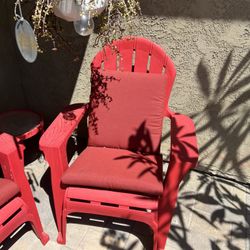 Two Red And One Blue Plastic Chair With Red Table