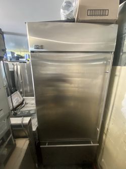 MONAGRAM fridge used as new at a good negotiable price