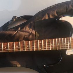 Fender/Squier Strato  Guitar  with  Tuner & Amp  $325