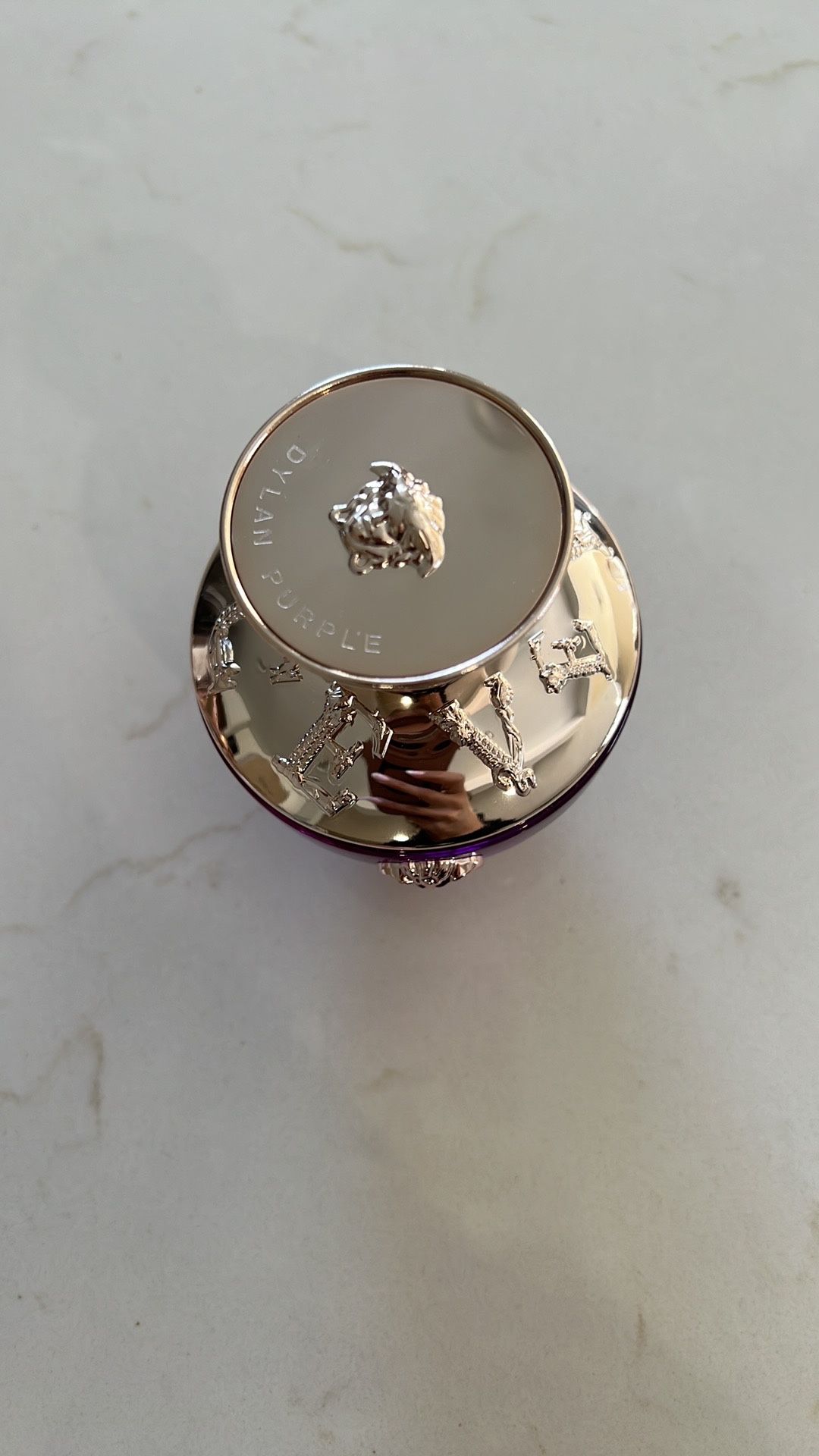 Luxurious Purple Perfume Bottle with Silver Accents