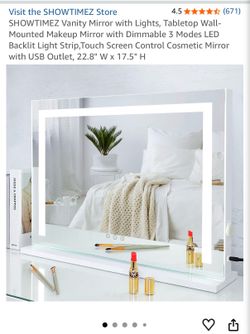 Vanity mirror with lighting